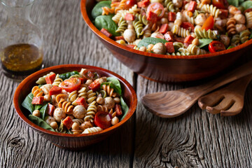 Italian Pepperoni Pasta and Spinach Salad with fresh mozzarella, tomatoes and chickpeas