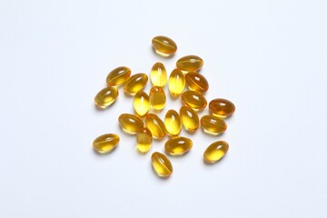 Capsule of omega 3, 6, 9 fish oil, vitamin, food supplement on white background 