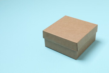 Сardboard box on color background