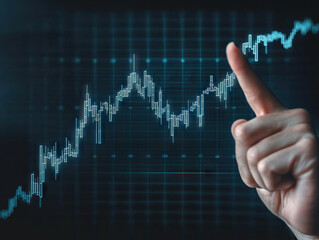 Businessman hand pointing to financial growth chart with futuristic digital interface