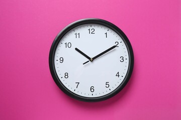Big beautiful stylish clock on color background