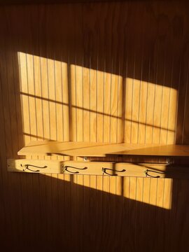 Morning Sunlight on Coat Hooks