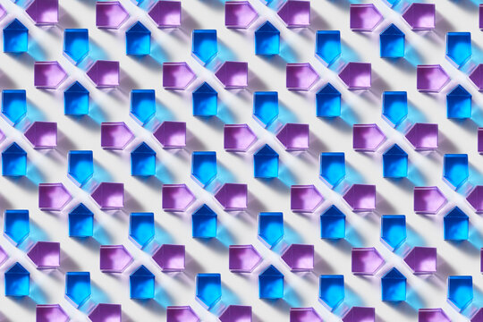 Seamless pattern of pentagonal prisms in blue and purple tones