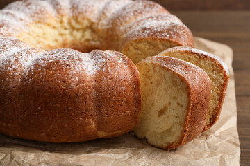 Freshly baked sponge cake on table, closeup