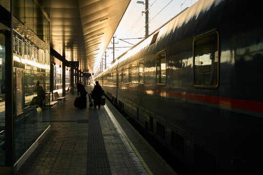 A night train arrives at a station in Austria, Europe at dawn