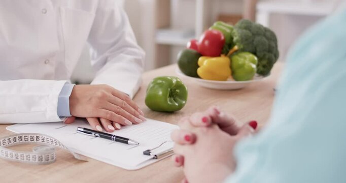 Nutritionist, dietitian talks to diagnose and treat woman with nutrition problems and to help eat healthy meal. Health consultation on food, diet, weight loss, body exercise, improve eating habits