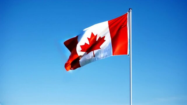 Canadian Flag Waving Against Blue Sky - National Pride and Celebration