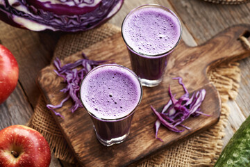 Purple cabbage juice with red apples and cucumber