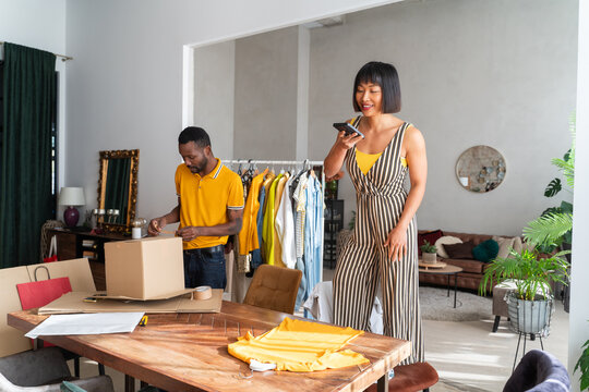 People Preparing To Sell Second Hand Clothes Online 