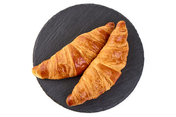 Two buttery croissants isolated on white background.