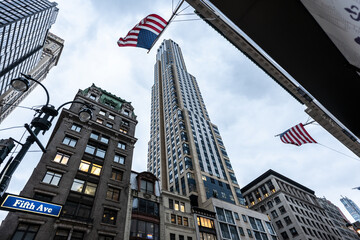 American flags waving over fifth avenue in manhattan, new york city