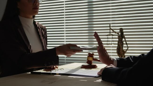 Businesswoman refusing money offered by businessman, rejecting illegal deal, anti bribery and corruption concept