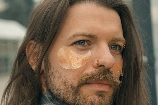 Brutal man with eye patches
