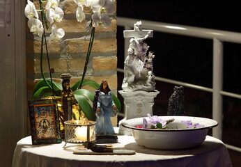 table with religious images of various trends with good intentions for the beginning of a new year