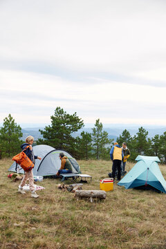 People establishes a camp on a mountain