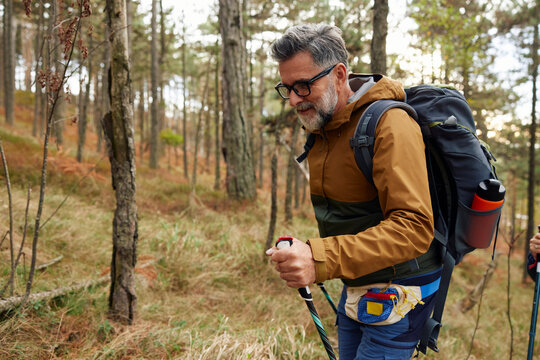 Man trekking through the forest