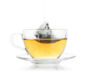 Cup with tea bag isolated on white