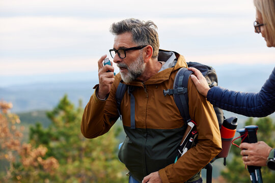 Man regains his breath with inhaler