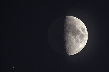 Moon at the midnight with stars in background