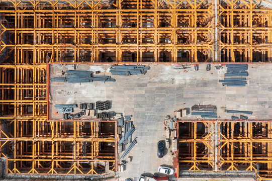 Aerial View of Construction Site with Steel Beams.