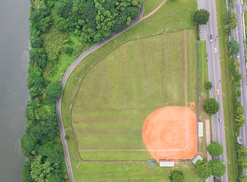 Aerial View of Riverside Baseball Field Surrounded by Nature