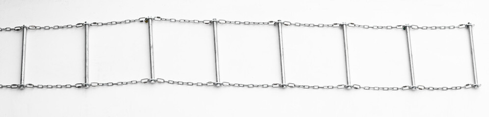 steel ladder on chains isolated on white background © serikbaib