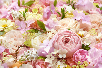 Delicate blooming festive roses and hydrangea summer flowers, blossoming rose flower soft pastel background, bridal bouquet floral card, selective focus, shallow DOF