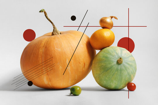 Abstract set of fruits. Decorated pumpkins, tangerine and tomatoes.