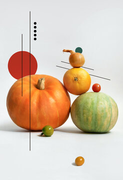 Abstract set of fruits. Decorated pumpkins, tangerine and tomatoes.