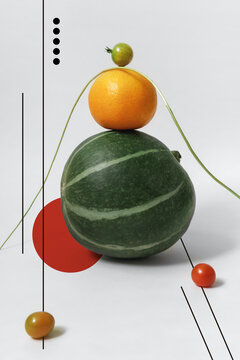 Abstract set of fruits. Decorated pumpkins, tangerine and tomatoes.