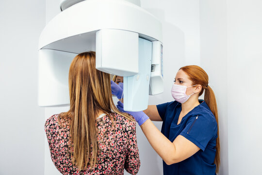 Dental Clinic X-Ray Procedure with Technician and Patient