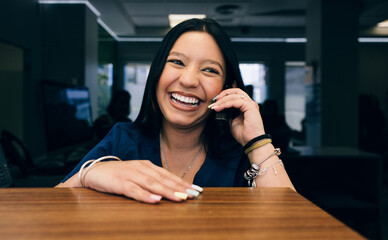 Receptionist Smiling Cheerfully at Dental Clinic Front Desk