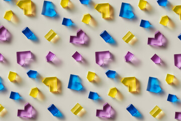 Translucent geometric shapes creating seamless colorful pattern