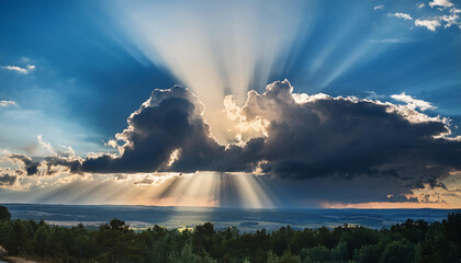 the sun s rays breaking through the clouds in straight lines against a background of blue sky and thunderclouds