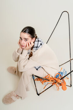 Girl in Modern Chair