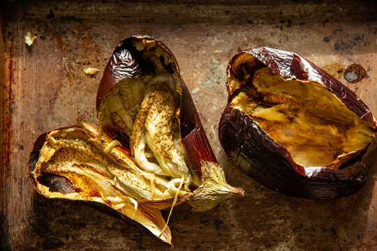 Aubergines that have been blackened in the oven.