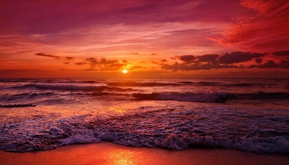 crimson sunset waves on ocean shoreline at golden hour