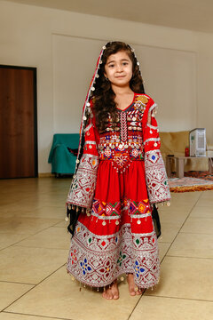 Afghan girl in traditional dress 