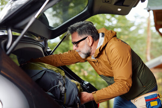 Packing luggage into the car