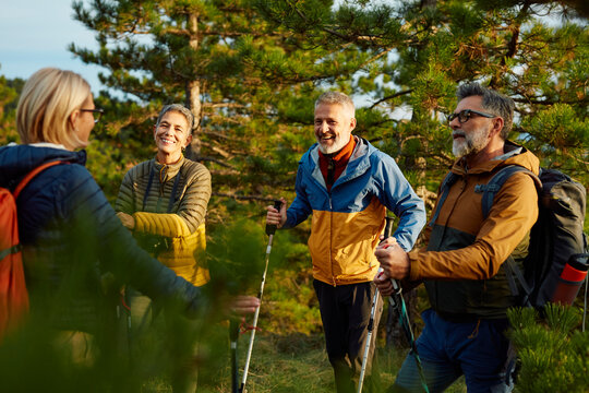 Hikers enjoy conversation on a mountain