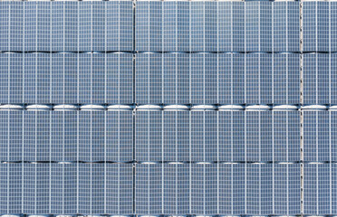 Aerial View of Solar Panels on Factory Roof for Renewable Energy