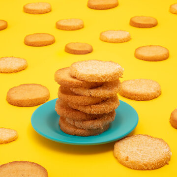 Coconut Cookies Stacked on Blue Plate