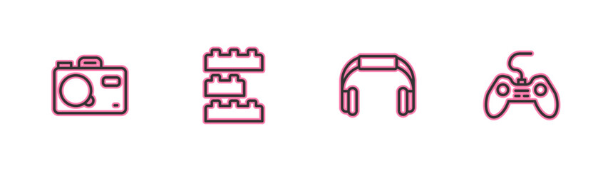 Set line Photo camera, Headphones, Toy building block bricks and Gamepad icon. Vector