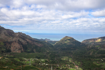 Naklejka premium mountain, mountains, algeria, africa, landscape, nature, sky, panorama, outdoor, peak, hill, background, scenery, view, travel, rock, forest, valley, beautiful, hiking, adventure, scenic, tourism.