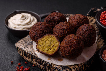 Fried chickpea falafel balls with salt, spices and herbs