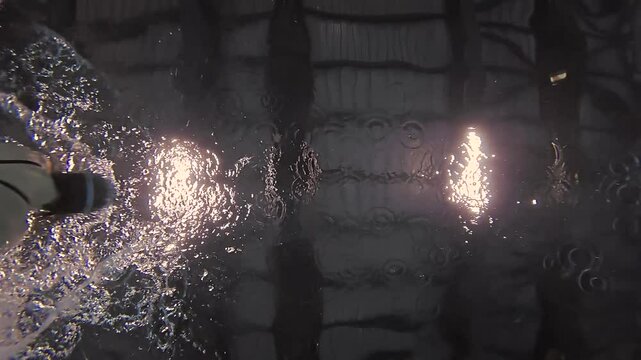 backstroke swimming, an underwater view.