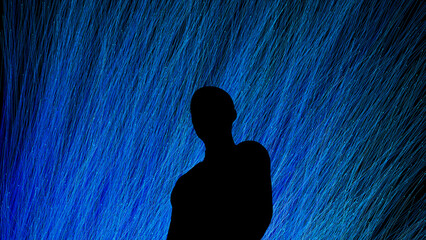 Silhouette of a man against a vibrant technological backdrop