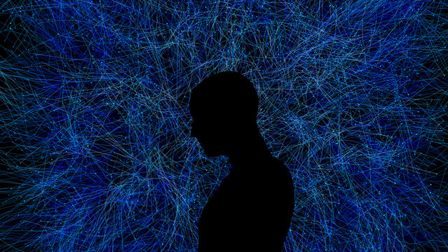 Silhouette of a man against a vibrant technological backdrop