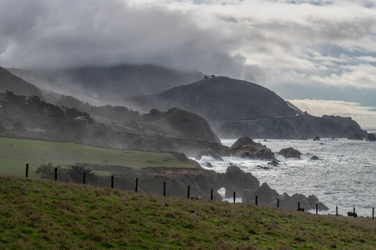 mysterious coastal landscape with fog