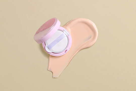 Open Compact with Beige Foundation on Neutral Background